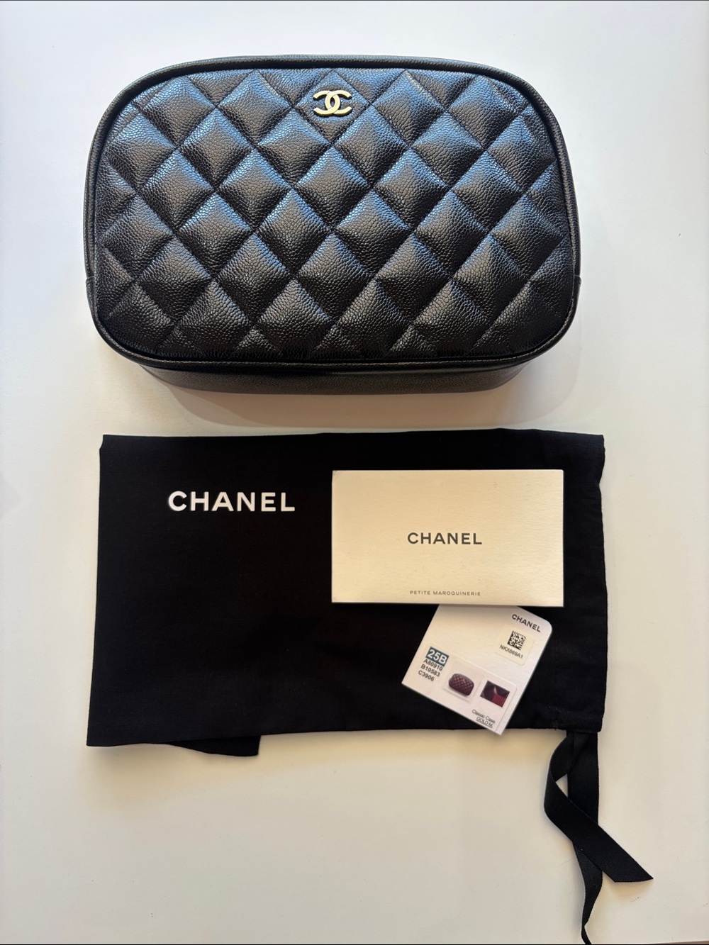 CHANEL Black Quilted Leather Pouch with Gold CC Logo
